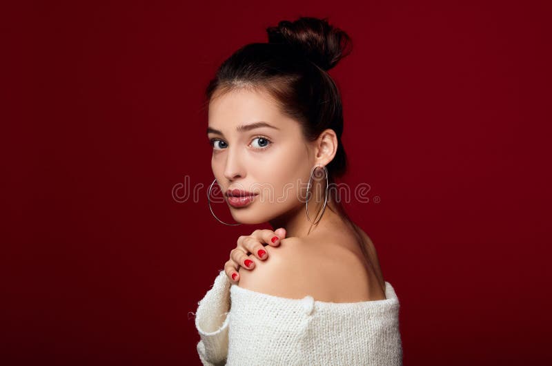 A young thin girl with snow-white skin and blue eyes