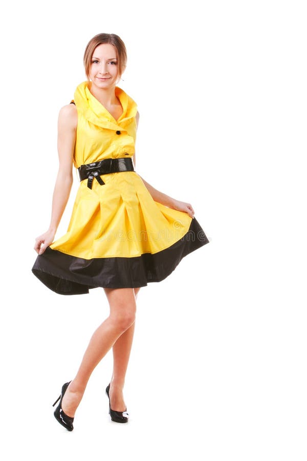 Young pretty girl in yellow dress