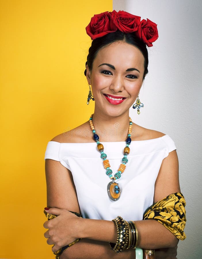 Young Pretty Mexican Woman Smiling Happy On Yellow Background