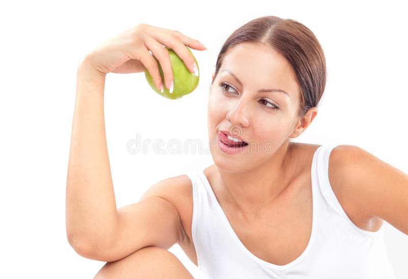 Young pretty woman holding apple