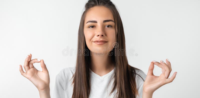 Young Pretty Woman with Long Chestnut Hair Straight Hair Keeps Hands in  Mudra Gesture, Holds Fingers in Yoga Sign Stock Image - Image of pretty,  body: 193492045