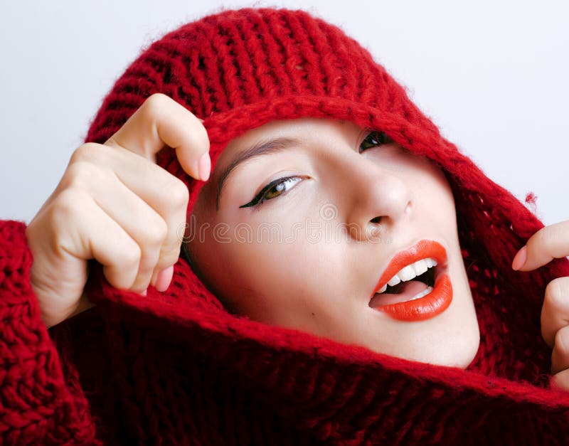 Young Pretty Woman In Sweater And Scarf All Over Her Face Stock Image 