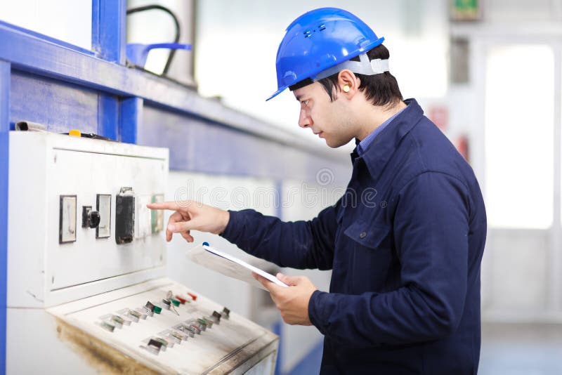 Young professional electrician at work stock photo