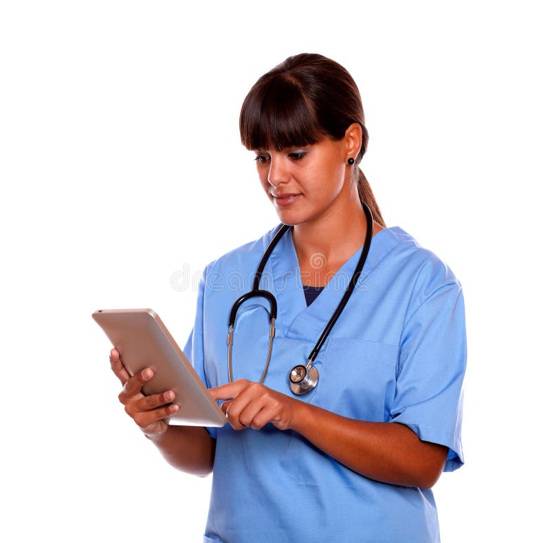 Young professional nurse using her tablet pc stock images Young professional nurse using her tablet pc stock images