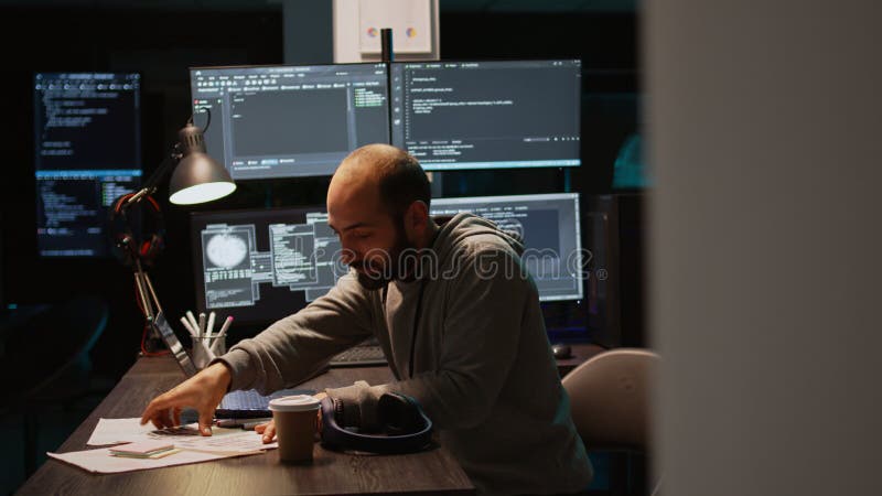 Young Programmer Typing Server Code on Multiple Monitors Stock Image ...