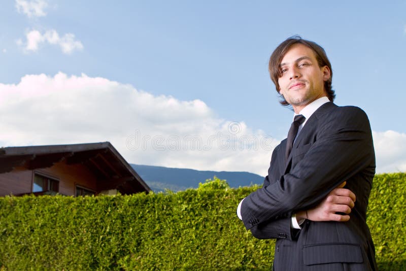 Young realtor with blue skies