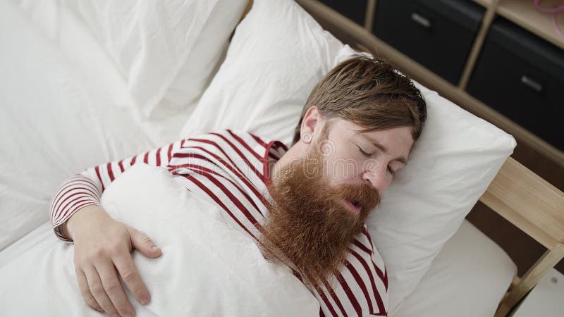 Young Redhead Man Lying on Bed Sleeping at Bedroom Stock Photo - Image ...