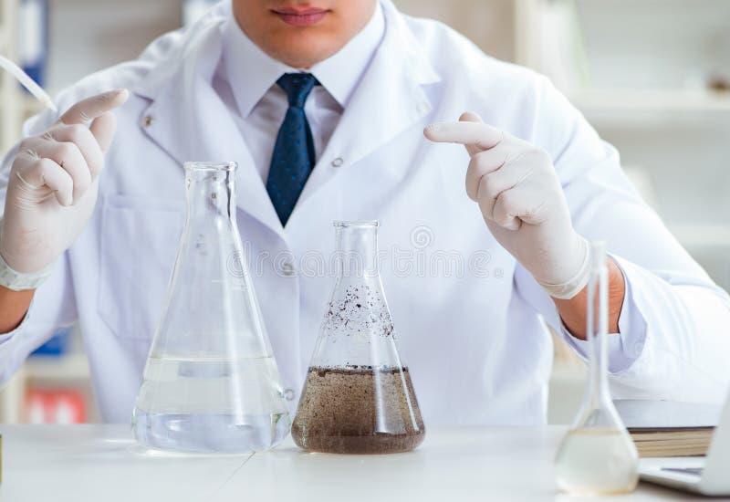 Young Researcher Scientist Doing a Water Test Contamination Expe Stock Image Image of pointing