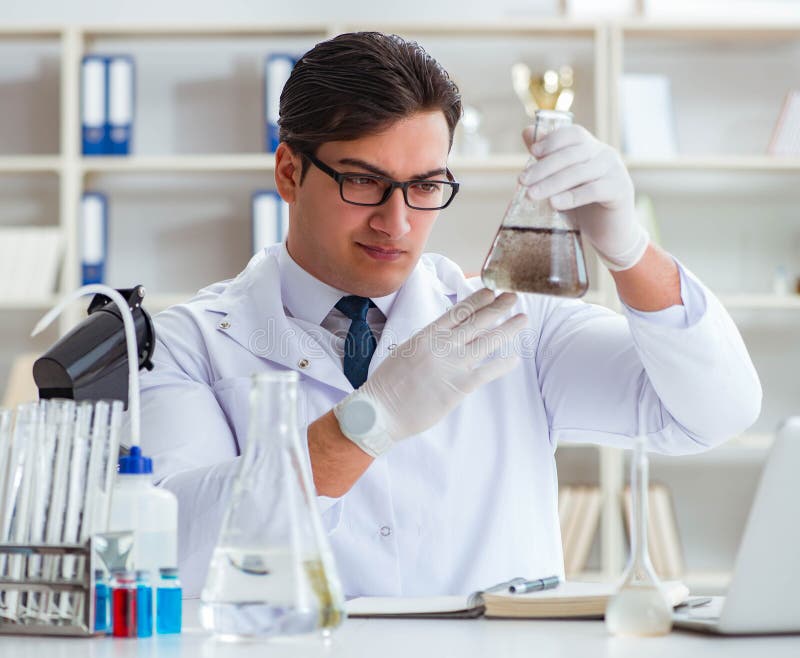 Young Researcher Scientist Doing a Water Test Contamination Expe Stock