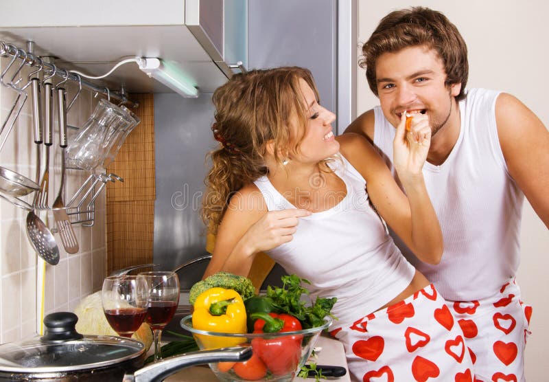 Young romantic couple in the kitchen