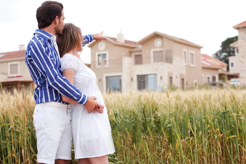 Young romantic couple standing together