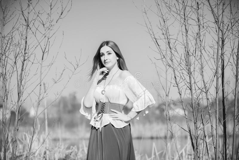 Young romantic redhead woman in casual style, lifestyle portrait