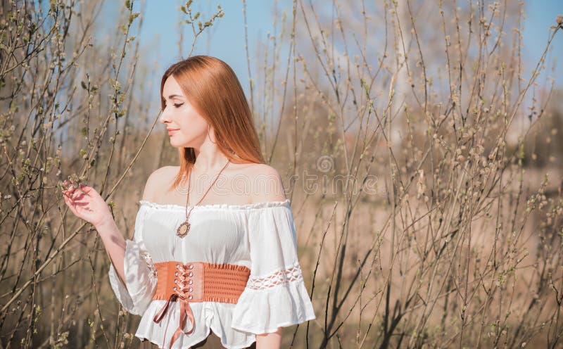 Young romantic redhead woman in casual style, lifestyle portrait