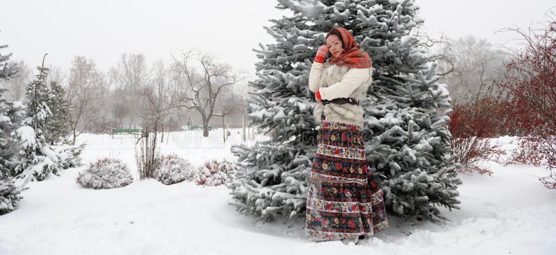 Young Russian woman in winter park