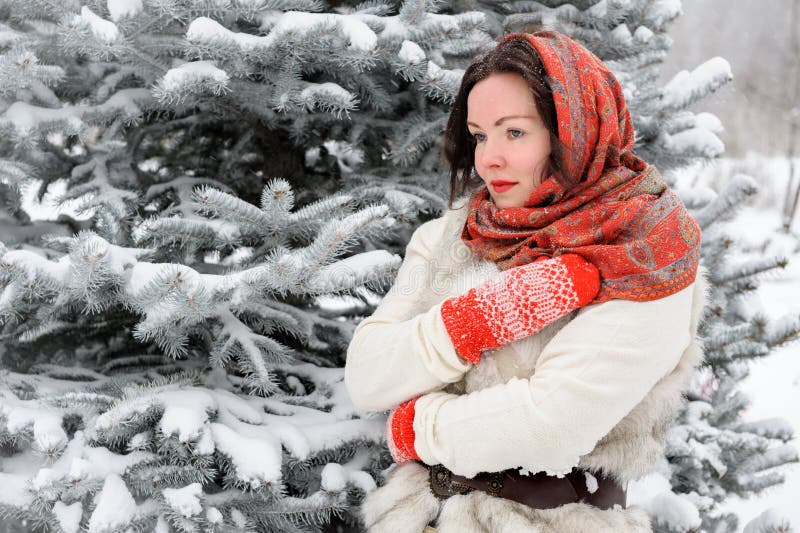 Young Russian woman in winter park