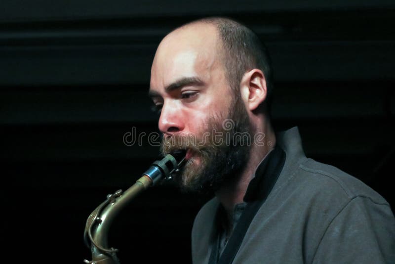 Young saxophone player stock photo. Image of musician 89496552