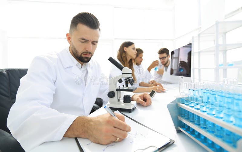 Young scientist works in the lab.