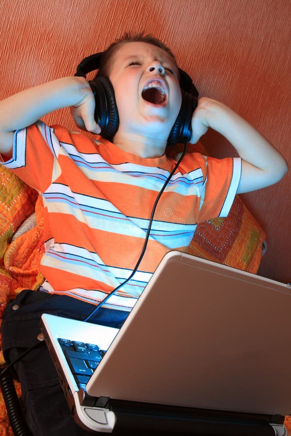 Young screaming kid with headphones