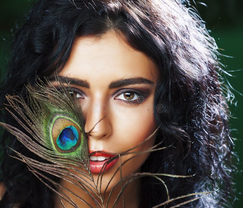 Portrait of a Woman with Peacock Feathers for Hair · Creative Fabrica