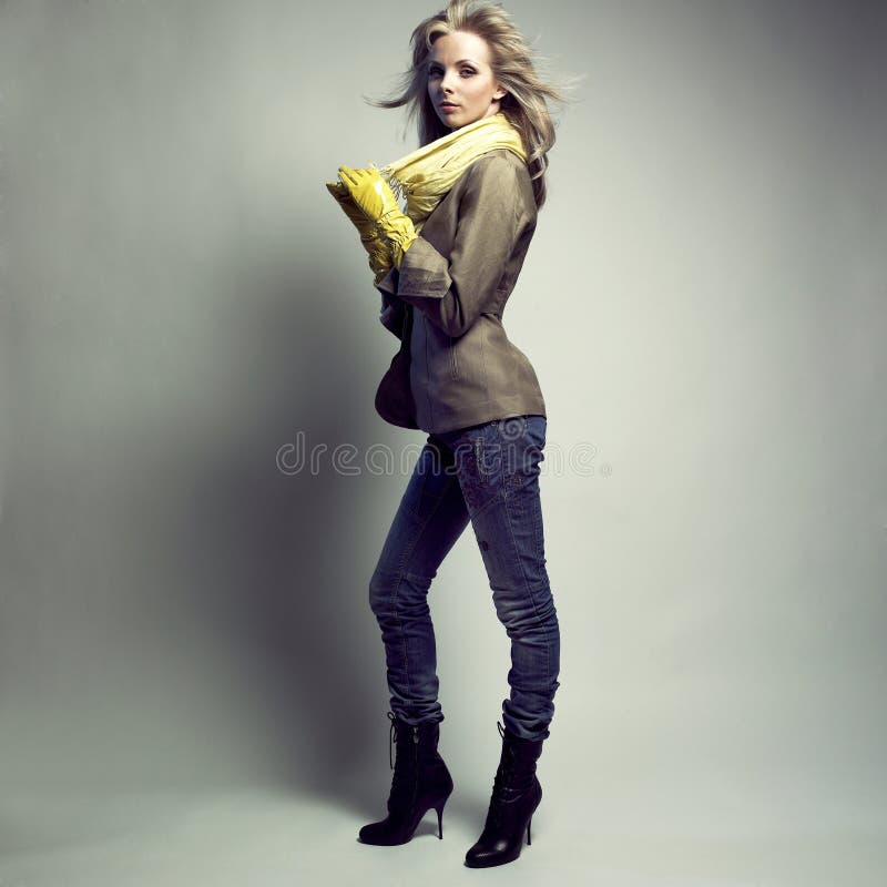 Young sensual woman in jeans royalty free stock images