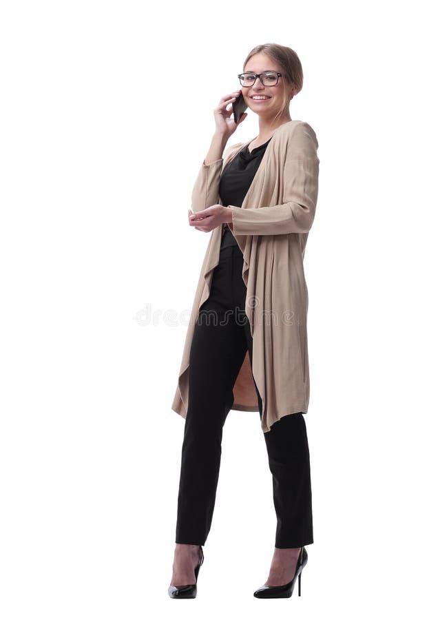 Young serious woman talking on the phone. isolated on white stock photos Young serious woman talking on the phone. isolated on white stock photos