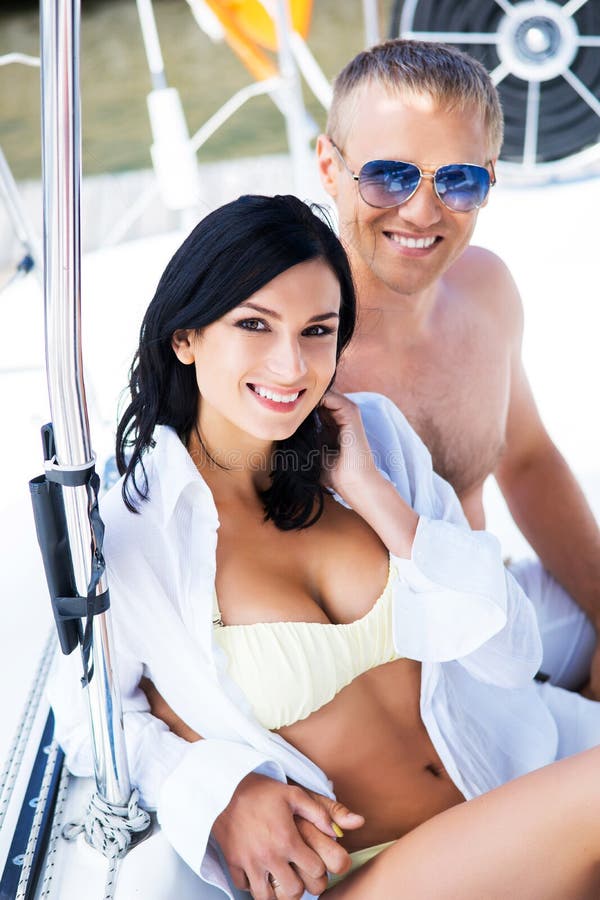 Young And Couple Relaxing In Swimsuits Stock Image - Image ...
