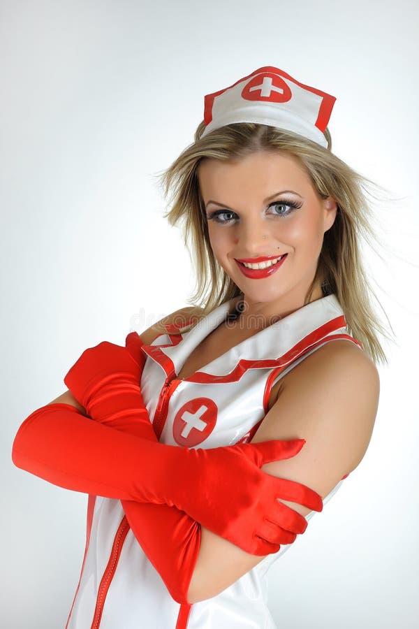 Young nurse with red hair stock photo. Image of healthy 13942878