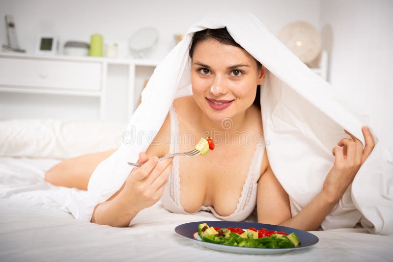 [Image: young-sexy-woman-undeer-blanket-eating-v...536343.jpg]