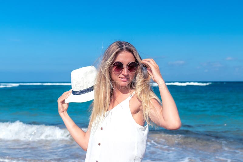 Young Woman with White Hat Walking on White Sand Beach a Tropical Bali ...