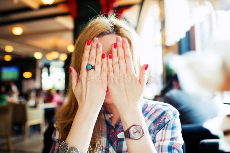 Young shy female closed her face stock photography Young shy female closed her face stock photography