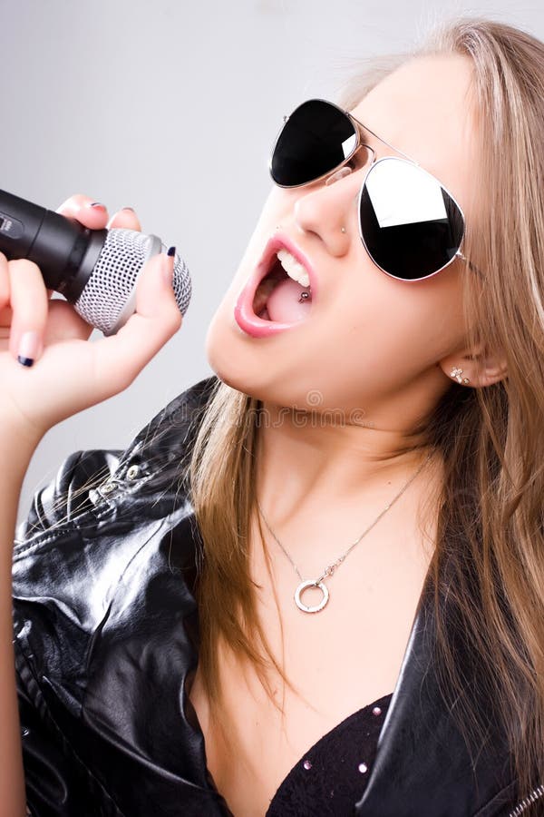 Young Singer with Microphone Stock Photo Image of female, isolated