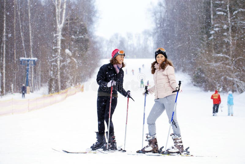 Young sisters with ski stock image. Image of beautiful 83038333
