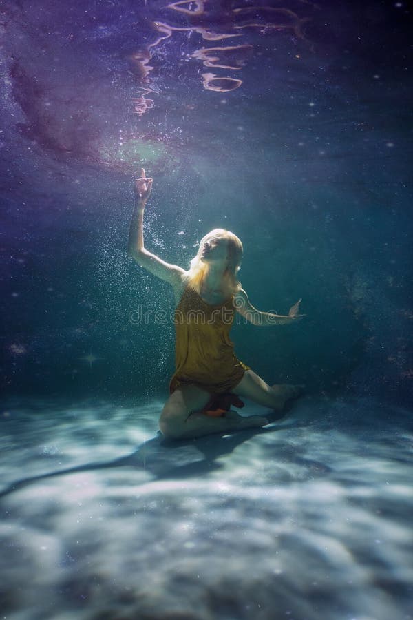 Young Slender Girl Underwater. Water Magic. Underwater Photography. Art ...