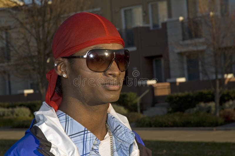 Young smiling African American man in sunglasses