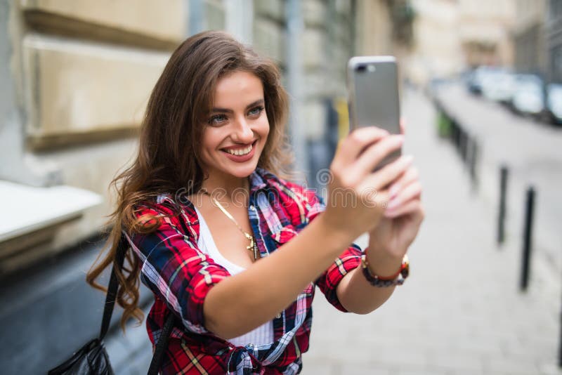 Young Smiling Attractive Beauty Brunette Girl Making Selfie Outdoor