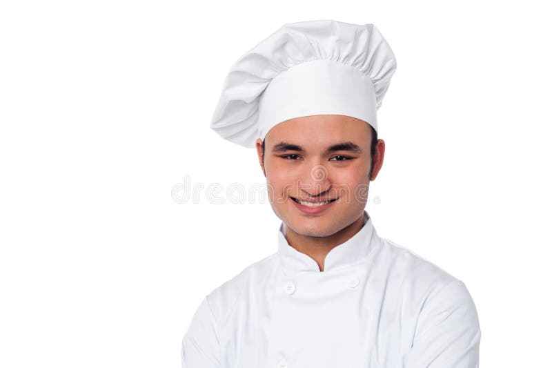 Young smiling confident male chef stock images