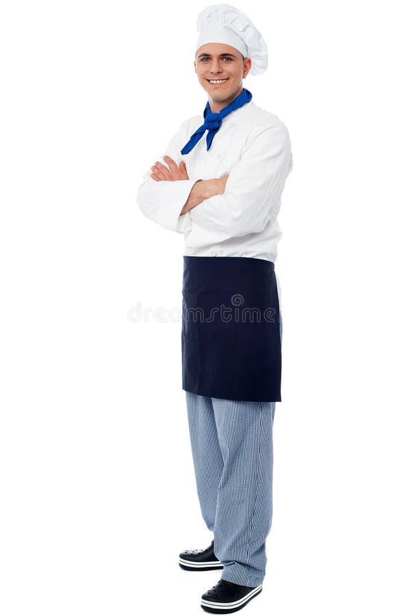 Young smiling confident male chef royalty free stock image