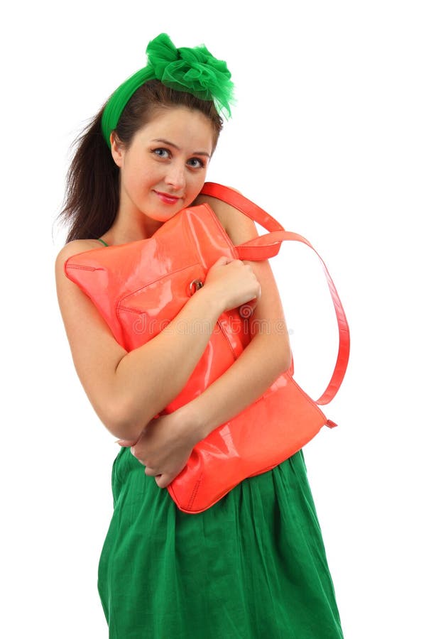 The young smiling girl with orange bag