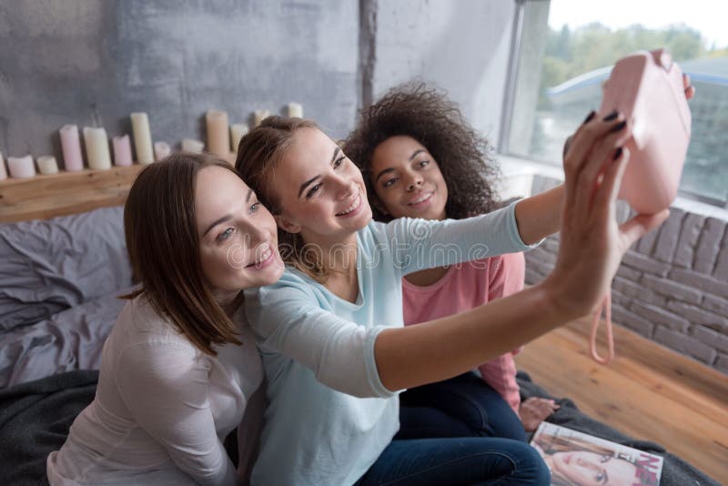 Young Smiling Girls Taking Selfie in the Bedroom at Home Stock Image ...