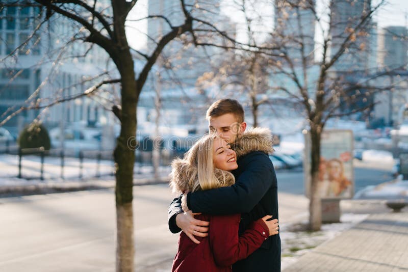 https://thumbs.dreamstime.com/b/young-smiling-happy-european-couple-hugging-winter-concept-165178235.jpg