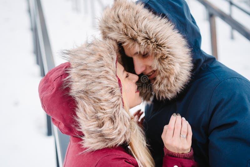 https://thumbs.dreamstime.com/b/young-smiling-happy-european-couple-hugging-winter-concept-165178303.jpg