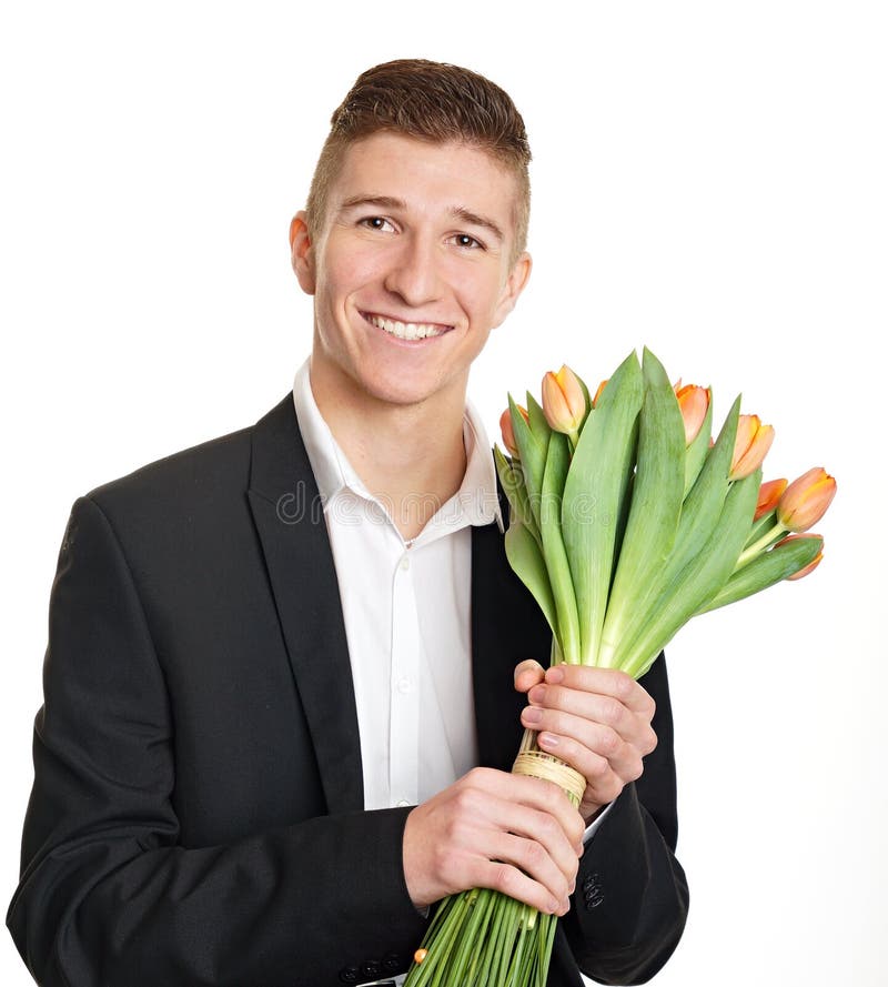 Young smiling man with tulips