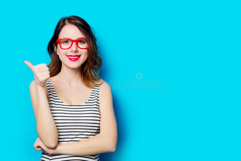 Young smiling woman in glasses