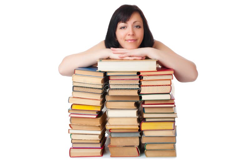 Young smiling woman with heap of books