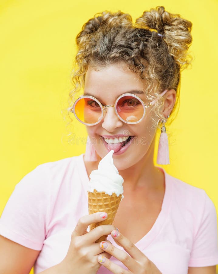 Young smiling woman with ice cream