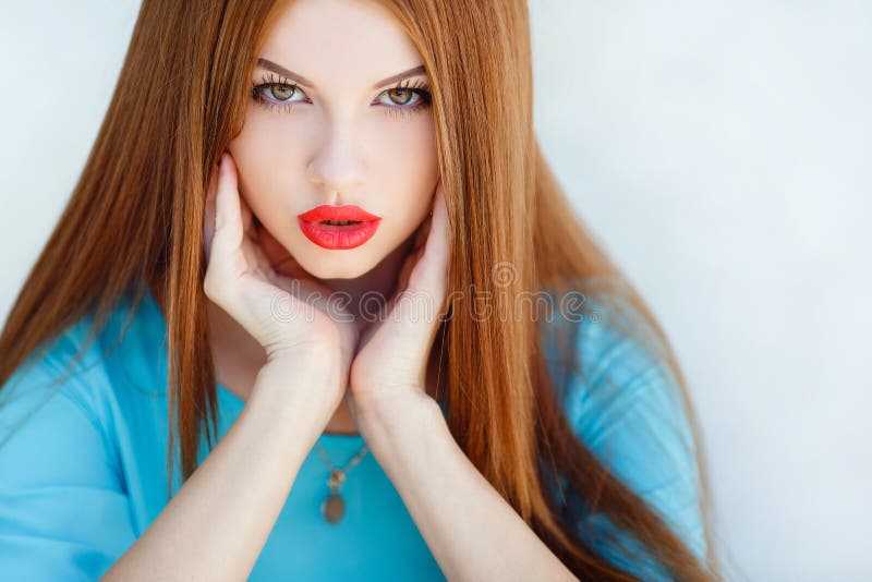 Young smiling woman outdoors portrait.