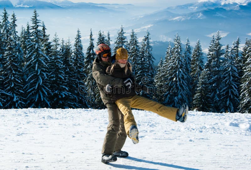 Young snowboarders fooling around