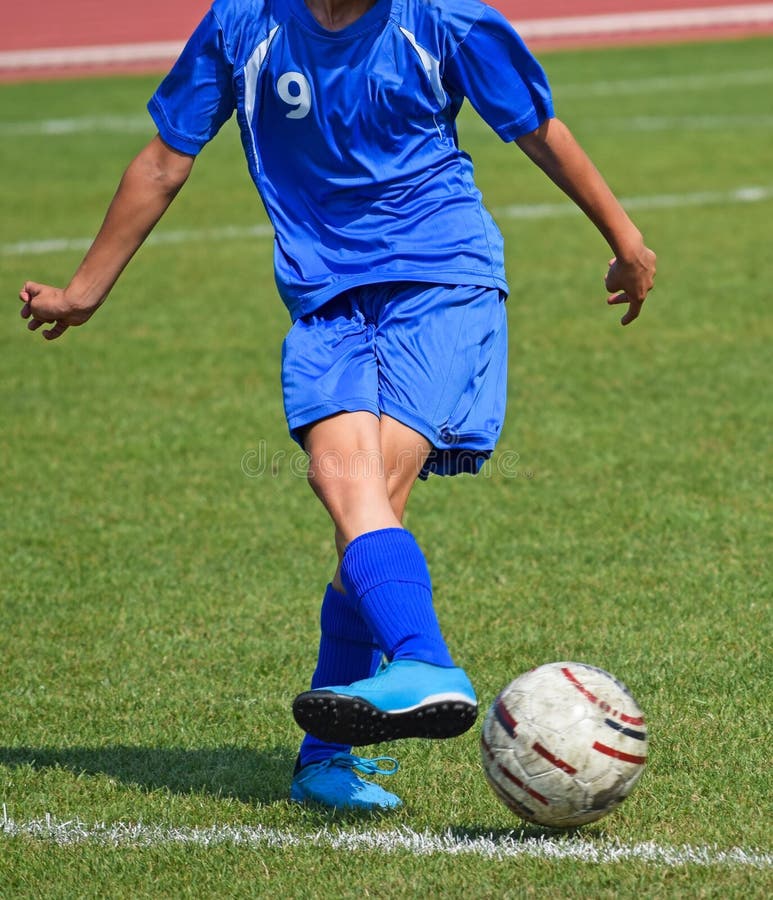 Young soccer player stock image. Image of grass, defender 59967473
