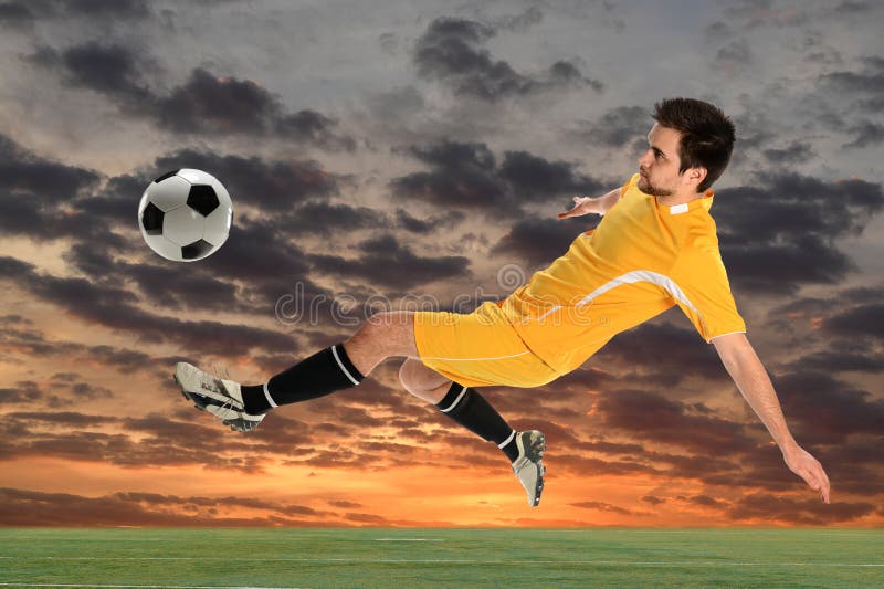 Young Soccer Player Kicking Ball stock photography Young Soccer Player Kicking Ball stock photography