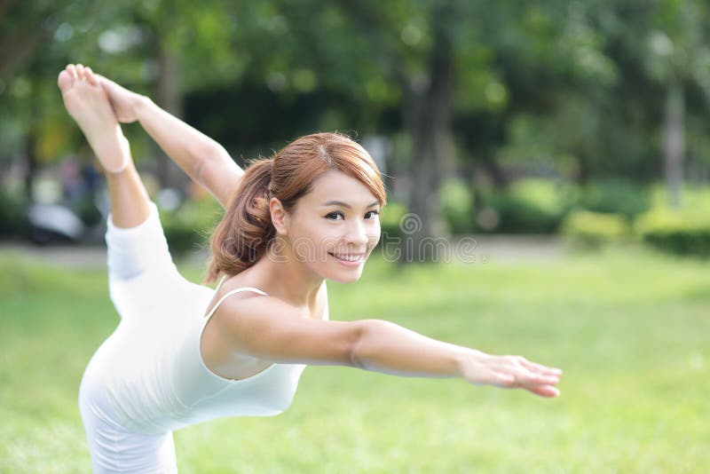 Young Woman Doing Yoga in the Park in the Morning Stock Image - Image ...